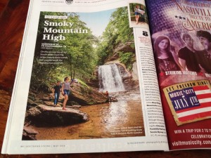 "Writer Valerie Rains and her travel mate Tim looking at Looking Glass Falls in Brevard, North Carolina"